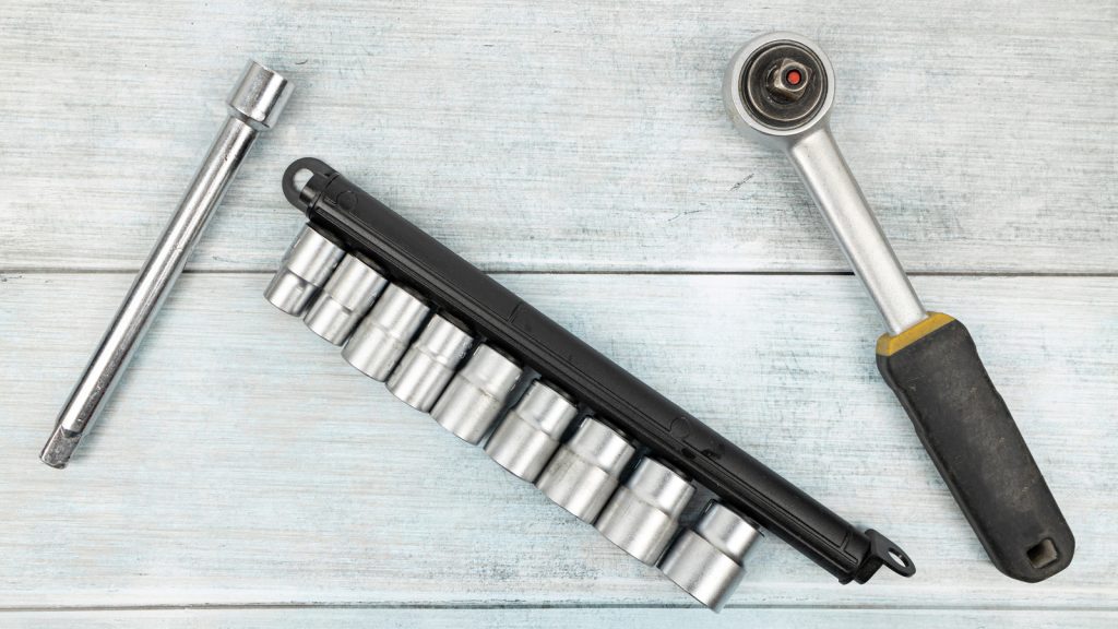 Who Created the Ratcheting Wrench with Interchangeable Tool Sockets?