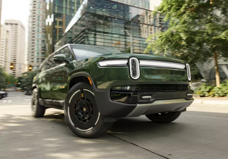 Uber invests as much as .25 billion in Rivian to launch 10,000 autonomous taxis.